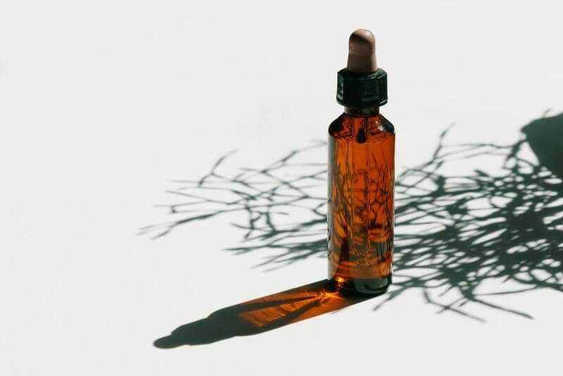 cedar oil in glass bottle for roach prevention